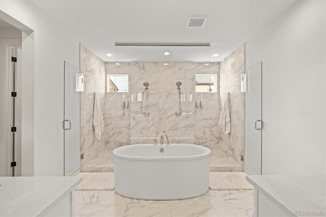 bathroom featuring tile walls and shower with separate bathtub