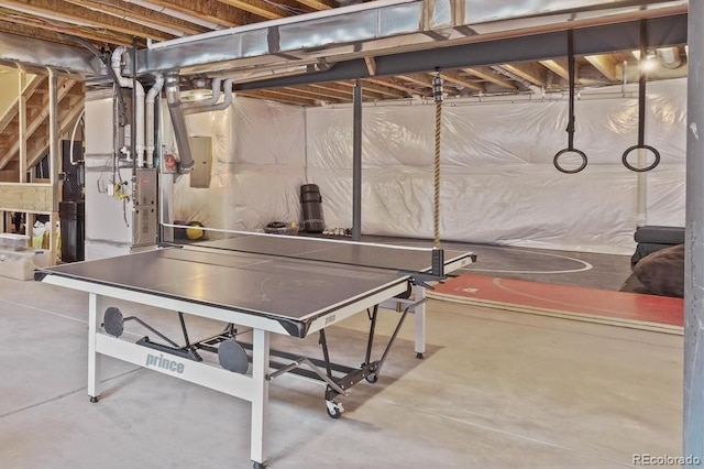 game room with concrete flooring