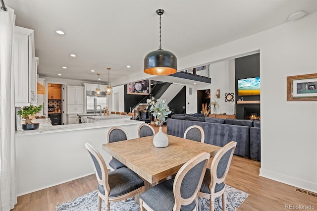 dining room featuring light hardwood / wood-style flooring