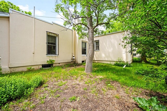130 S Humboldt St, Denver, CO 80209 - view of home's exterior with stucco siding