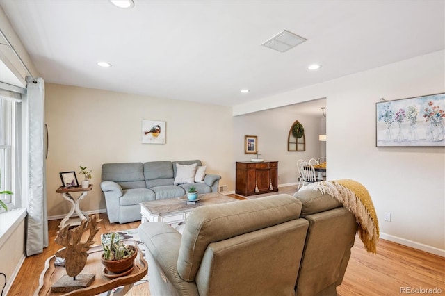 6410 Independence Way, Arvada, CO 80004 - living room with light wood-style flooring, recessed lighting, and baseboards