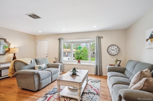 6410 Independence Way, Arvada, CO 80004 - living room featuring light wood-style floors and recessed lighting