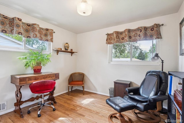 6410 Independence Way, Arvada, CO 80004 - sitting room with light wood-style flooring, baseboards, and an office area