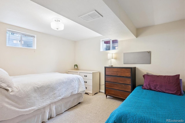 6410 Independence Way, Arvada, CO 80004 - bedroom with multiple windows and light carpet
