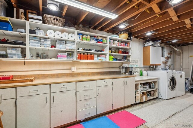 6410 Independence Way, Arvada, CO 80004 - laundry area featuring washer and clothes dryer and cabinet space