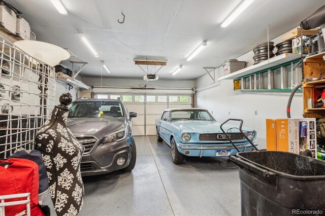 6410 Independence Way, Arvada, CO 80004 - garage featuring a garage door opener