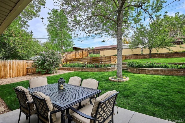 6410 Independence Way, Arvada, CO 80004 - view of patio / terrace featuring outdoor dining space