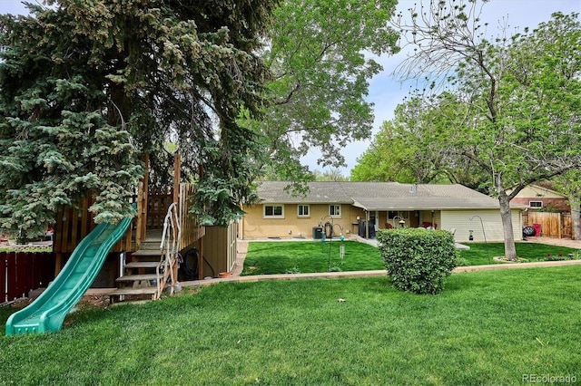 6410 Independence Way, Arvada, CO 80004 - rear view of house featuring a playground