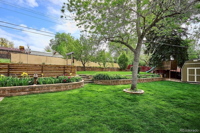 6410 Independence Way, Arvada, CO 80004 - view of yard with a storage unit and an outdoor structure
