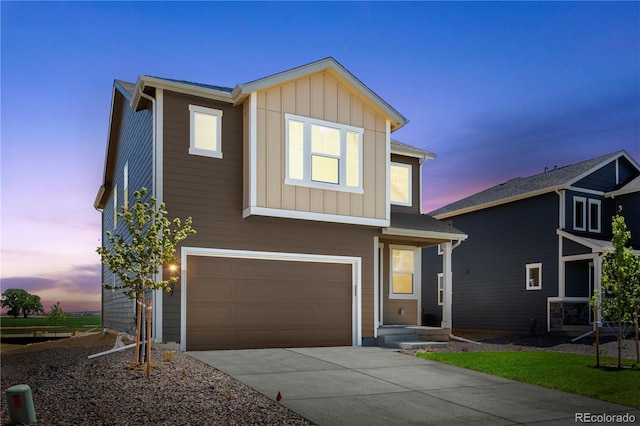 737 Muturu Rd, Johnstown, CO 80534 - traditional home featuring driveway, a garage, and board and batten siding