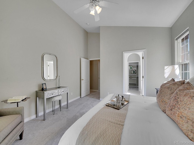 946 Champion Cir, Longmont, CO 80503 - carpeted bedroom featuring baseboards, high vaulted ceiling, and ceiling fan