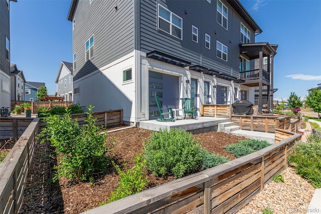 2080 Alcott Way, Broomfield, CO 80023 - back of property with a patio area and a balcony