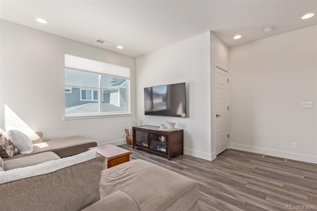 2080 Alcott Way, Broomfield, CO 80023 - living area with wood finished floors, baseboards, and recessed lighting