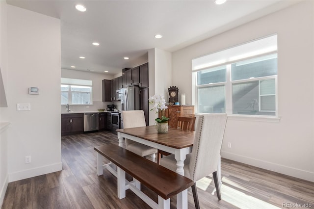 2080 Alcott Way, Broomfield, CO 80023 - dining room with wood finished floors, recessed lighting, and baseboards
