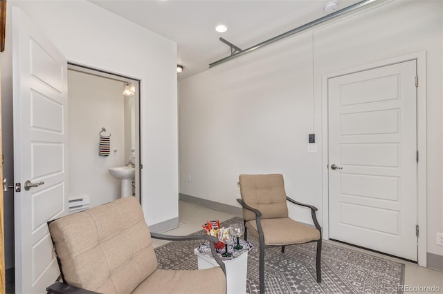 2080 Alcott Way, Broomfield, CO 80023 - sitting room with a baseboard radiator and recessed lighting