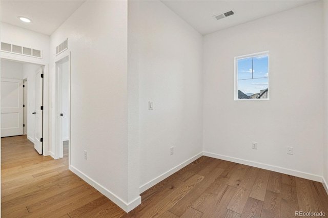 empty room with light wood-type flooring