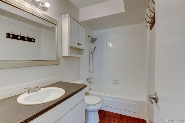 3855 S Monaco St Unit 177, Denver, CO 80237 - full bathroom with toilet, shower / tub combination, vanity, and wood finished floors