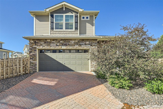 view of front of home with a garage