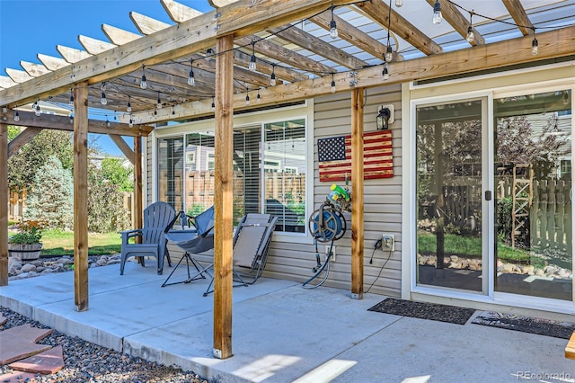 view of patio featuring a pergola