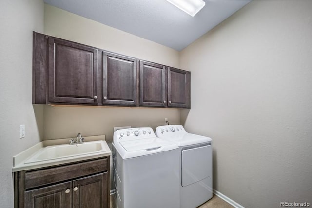 5865 Clover Ridge Cir, Castle Rock, CO 80104 - laundry area with cabinet space and separate washer and dryer