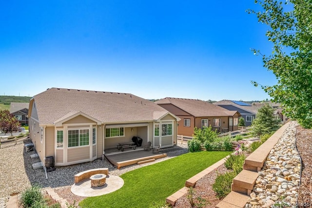 5865 Clover Ridge Cir, Castle Rock, CO 80104 - back of property featuring a yard, a fire pit, a deck, and a patio area