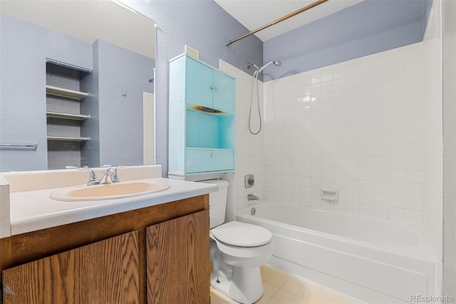 full bath with toilet, vanity, and bathing tub / shower combination