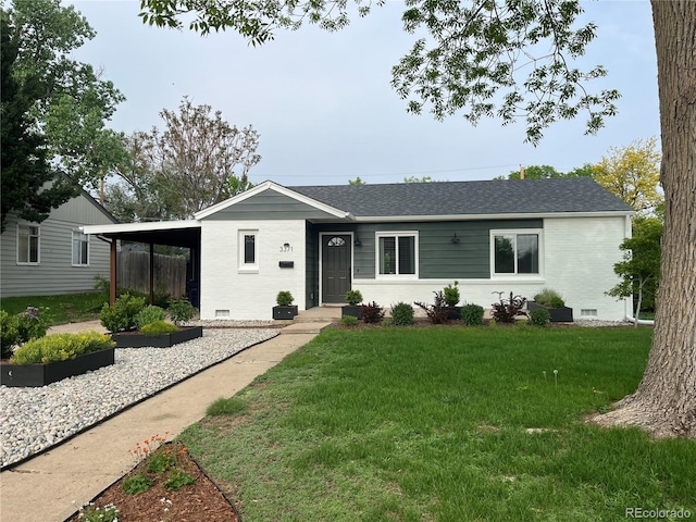 single story home with a front yard and a carport