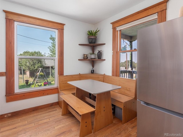 274 N Willow St, Crestone, CO 81131 - dining area with light wood-style flooring and baseboards