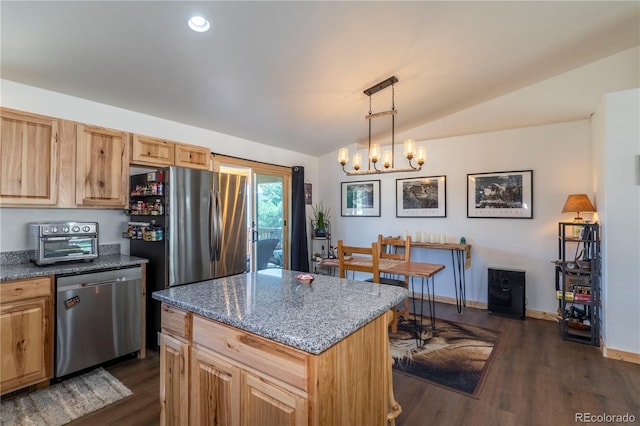 874 Hackamore Dr, Florissant, CO 80816 - kitchen with stainless steel appliances, vaulted ceiling, dark wood-style flooring, a chandelier, and a center island