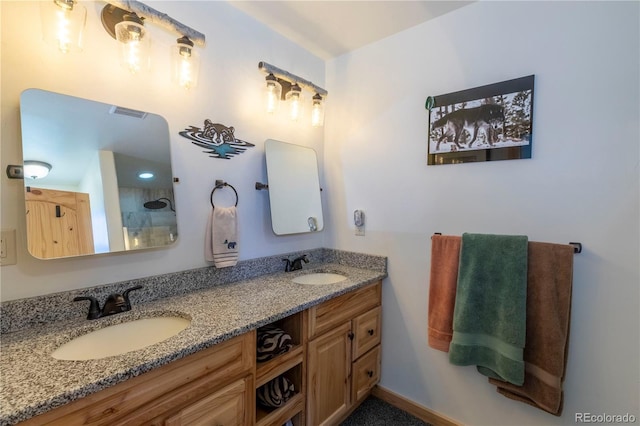 874 Hackamore Dr, Florissant, CO 80816 - bathroom featuring double vanity and a shower
