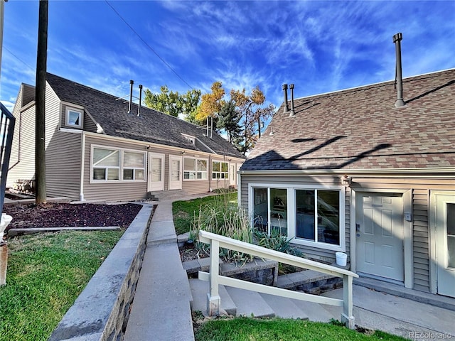 371 S Estes St Unit 10, Lakewood, CO 80226 - view of front of property featuring a shingled roof