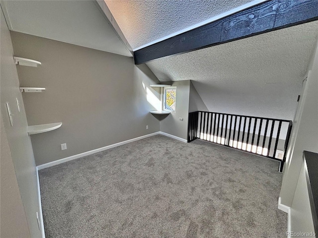 371 S Estes St Unit 10, Lakewood, CO 80226 - bonus room with lofted ceiling, a textured ceiling, carpet flooring, and baseboards