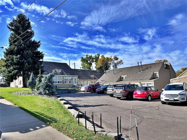 371 S Estes St Unit 10, Lakewood, CO 80226 - view of asphalt street with a residential view and sidewalks