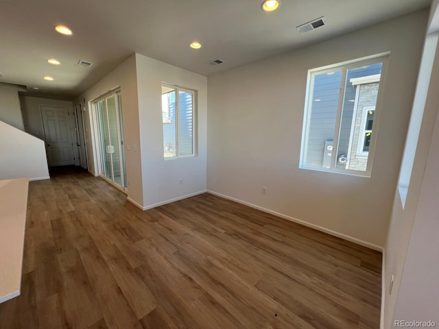 empty room featuring hardwood / wood-style floors