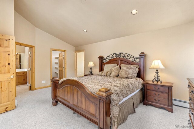 11 Hackamore Rd Unit B, Edwards, CO 81632 - bedroom with a baseboard heating unit, lofted ceiling, recessed lighting, and light carpet