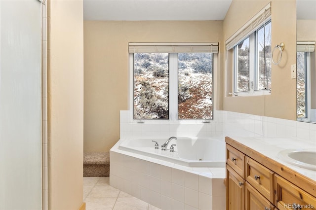 11 Hackamore Rd Unit B, Edwards, CO 81632 - bathroom featuring tile patterned flooring, a jetted tub, and vanity