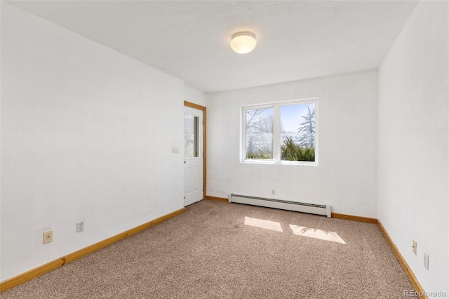 11 Hackamore Rd Unit B, Edwards, CO 81632 - empty room with a baseboard heating unit, baseboards, and carpet floors