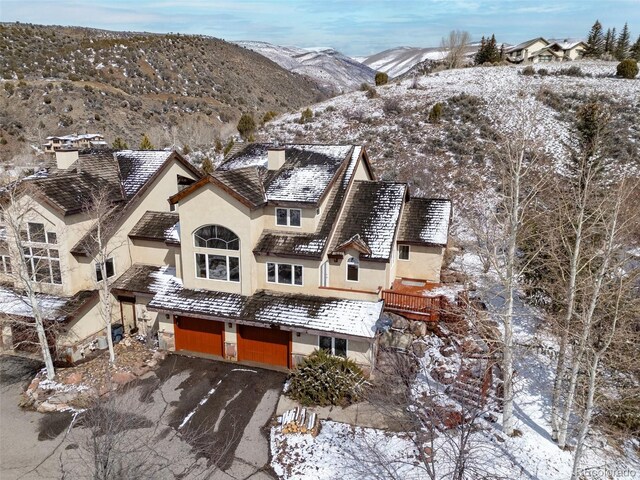 11 Hackamore Rd Unit B, Edwards, CO 81632 - snowy aerial view featuring a mountain view