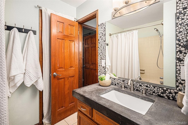 full bathroom with vanity, tile patterned flooring, and a shower with shower curtain