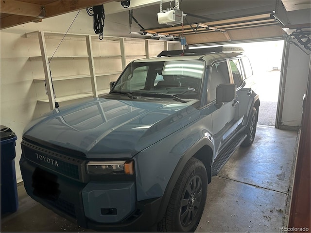 8304 S Upham Way, Littleton, CO 80128 - garage with a garage door opener