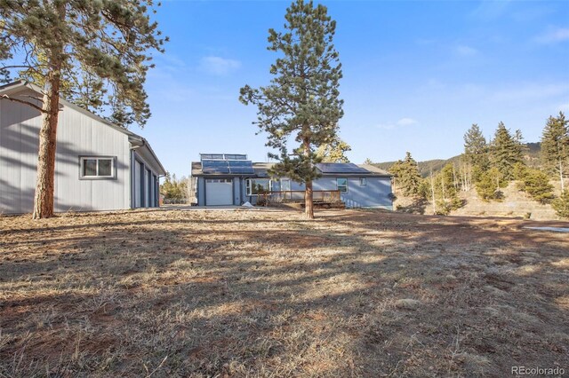 view of yard featuring an attached garage