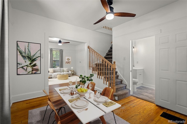 502 E San Miguel St, Colorado Springs, CO 80903 - dining space featuring ceiling fan, stairway, and wood finished floors