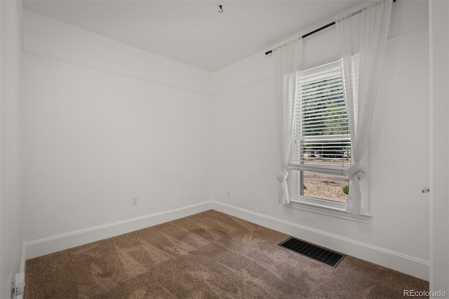 502 E San Miguel St, Colorado Springs, CO 80903 - empty room with carpet floors and baseboards