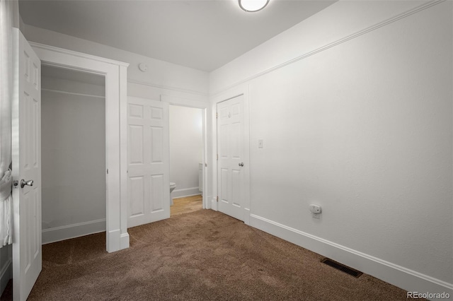 502 E San Miguel St, Colorado Springs, CO 80903 - unfurnished bedroom with carpet flooring and baseboards