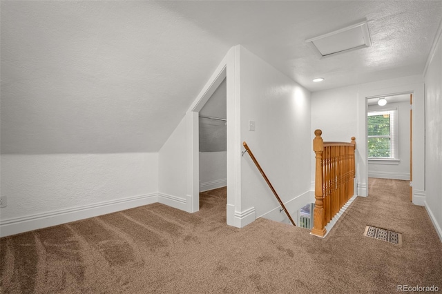 502 E San Miguel St, Colorado Springs, CO 80903 - bonus room with attic access, carpet floors, and a textured ceiling