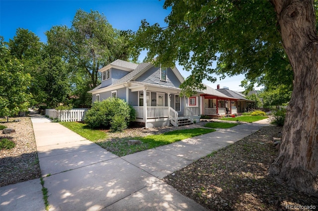 502 E San Miguel St, Colorado Springs, CO 80903 - view of front of home with a porch and a shingled roof