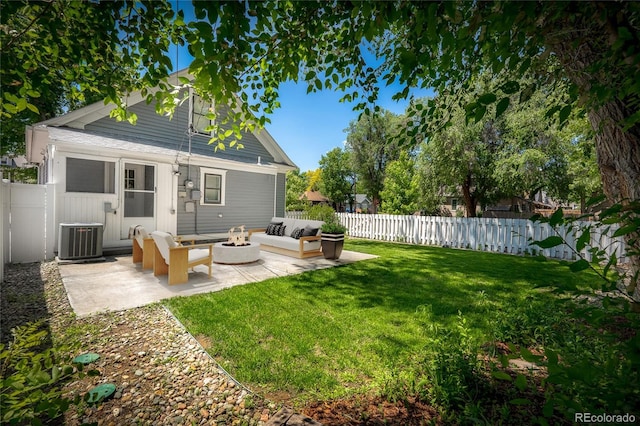 502 E San Miguel St, Colorado Springs, CO 80903 - rear view of house featuring a patio area, an outdoor living space with a fire pit, and a fenced backyard