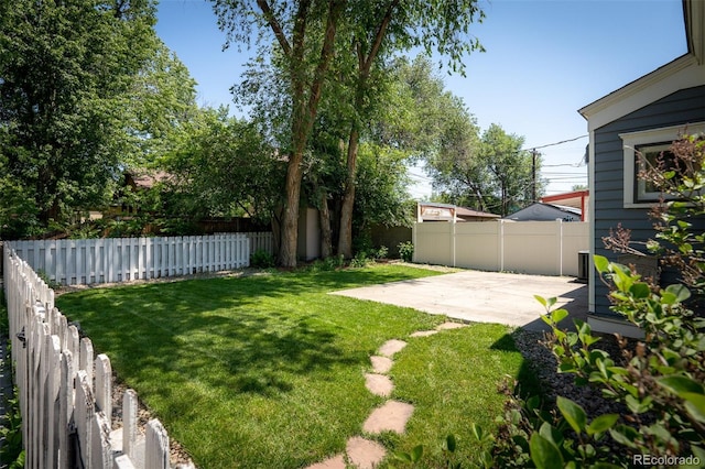502 E San Miguel St, Colorado Springs, CO 80903 - fenced backyard with a patio area