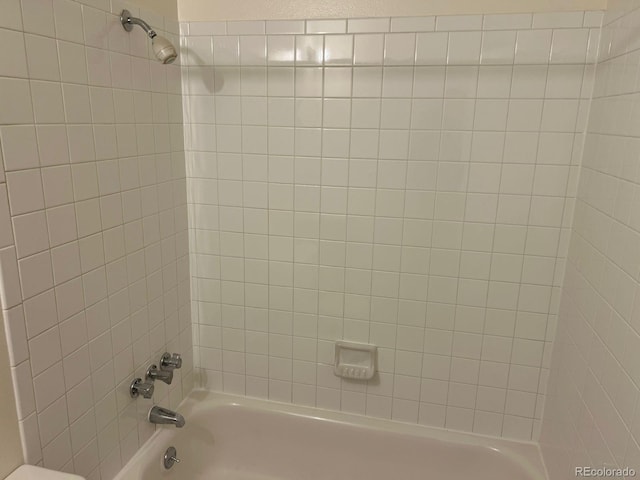 5543 Victor St, Denver, CO 80239 - bathroom featuring shower / tub combination