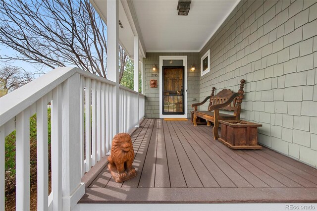 deck featuring covered porch
